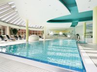 Hotelbad im Alpenhof in Murnau mit Wintergarten